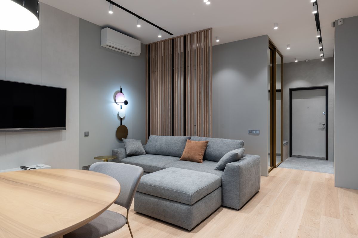 Living room with a wall-mounted AC unit