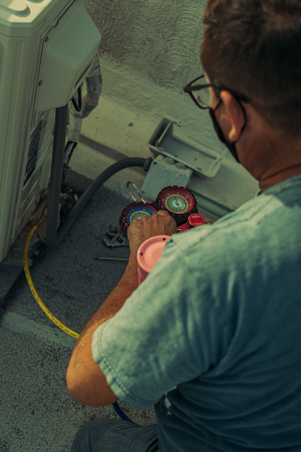 Servicing an outdoor AC condenser unit