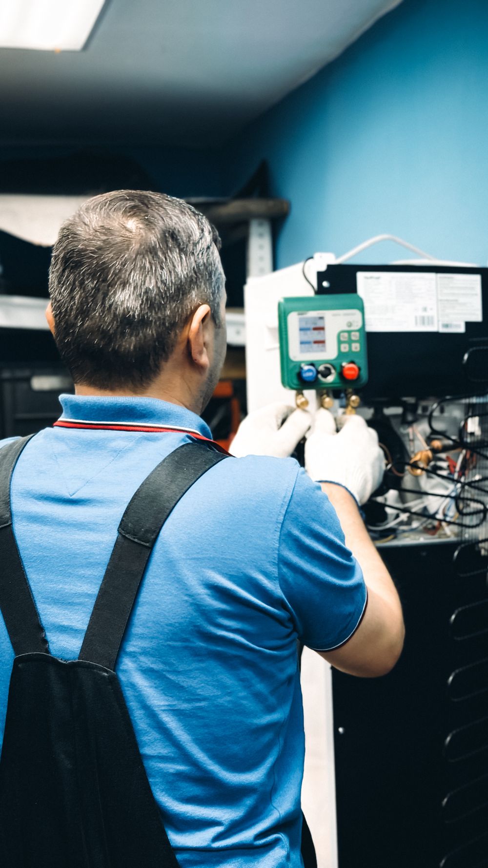 Technician repairing an indoor unit